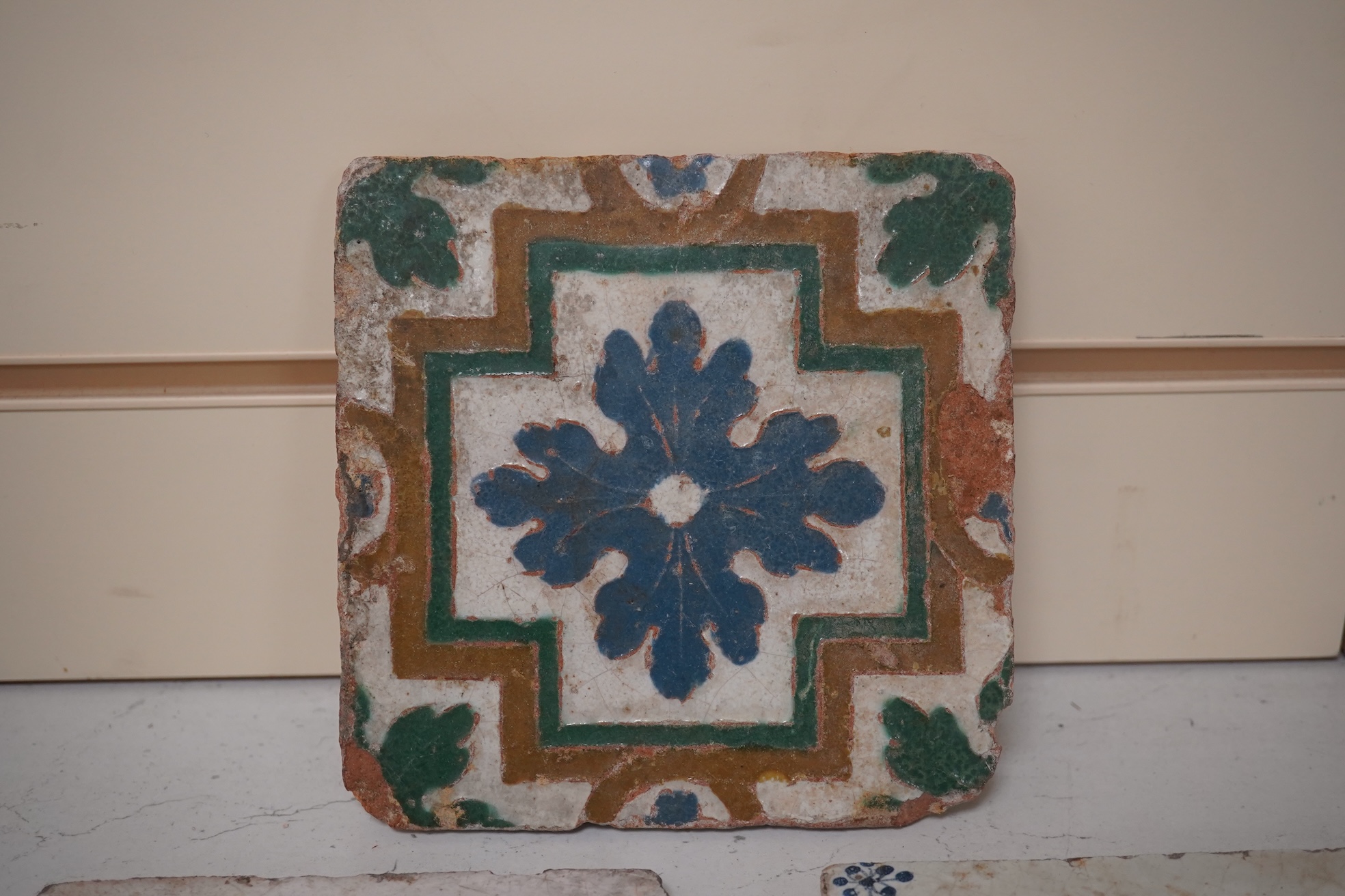 A collection of six assorted Delft tiles and one other, 18th century. Condition - varies